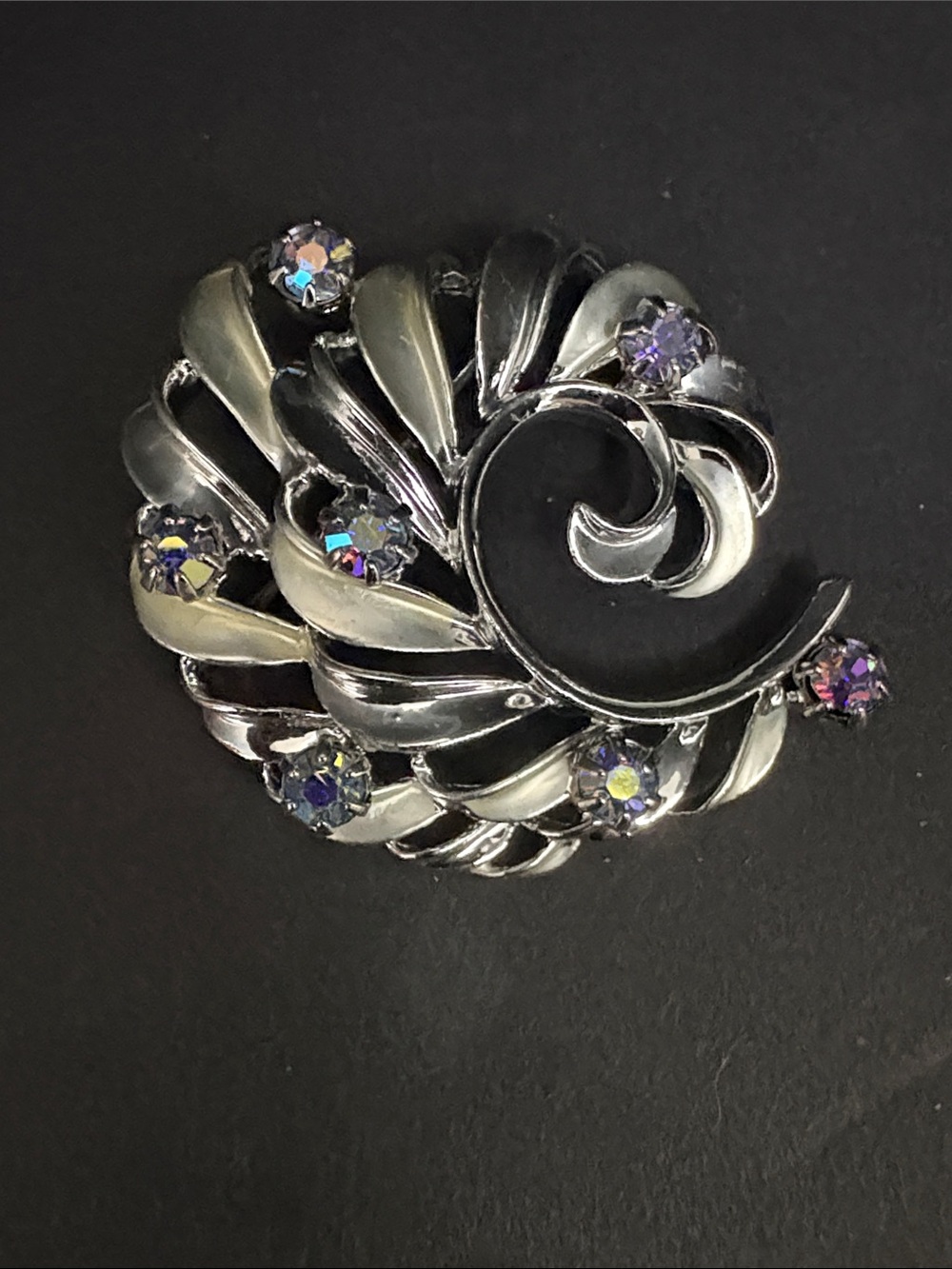 Vintage Silverstone Swirl Brooch with iridescent stones